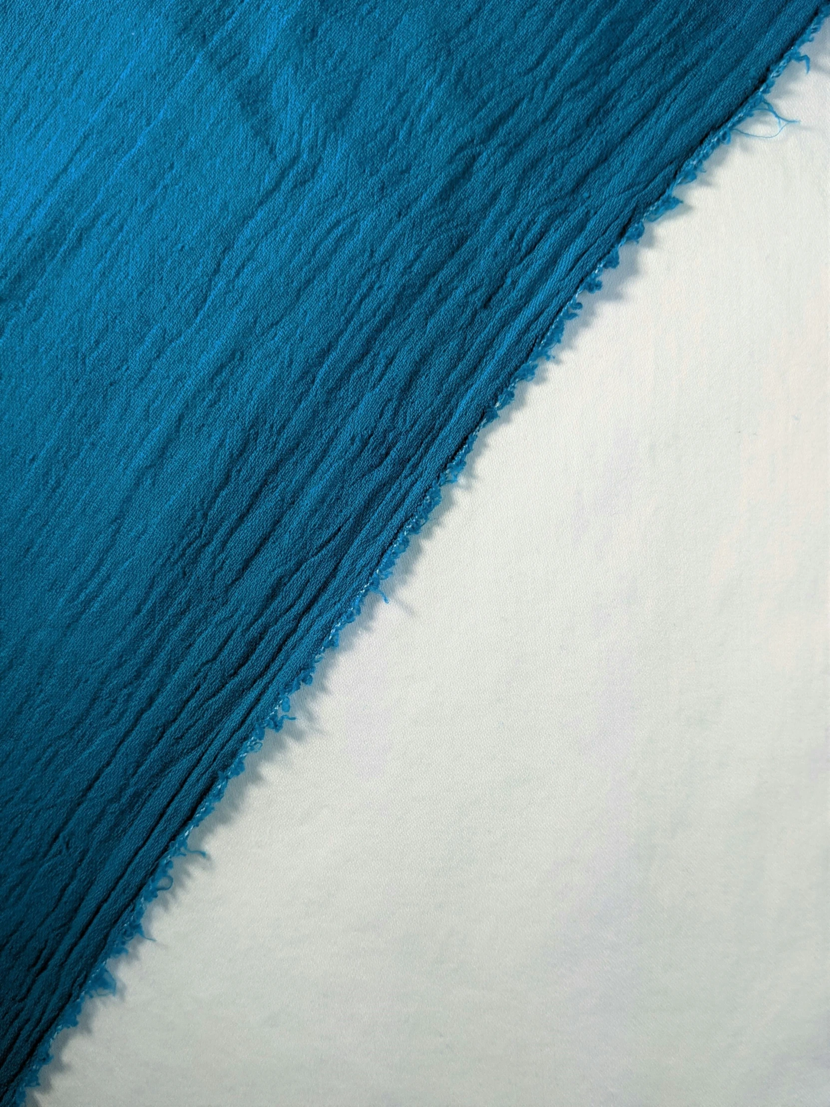 a blue and white cloth is displayed