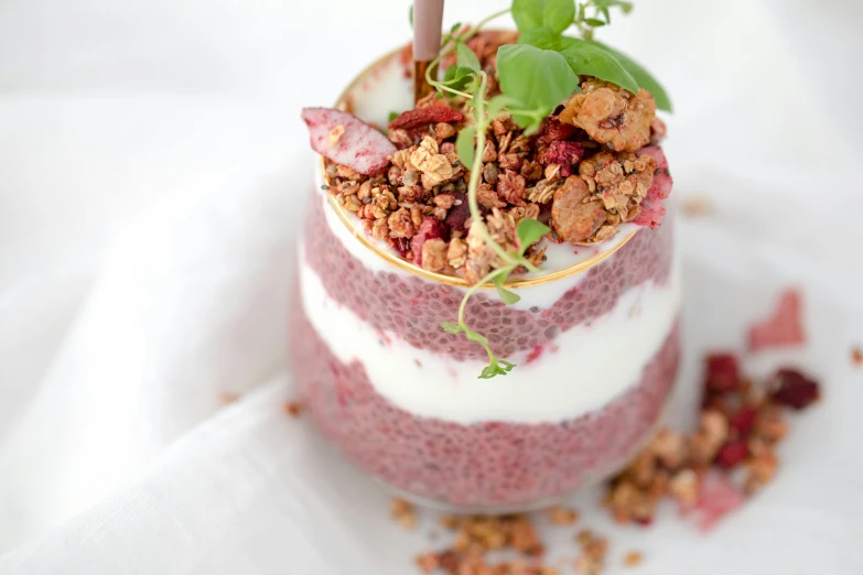 a glass filled with a bowl full of food