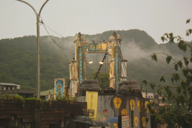 a giant gate that is painted blue and yellow