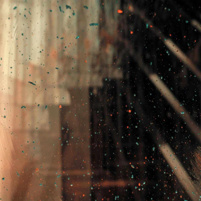 a view of a hallway through a rainy glass