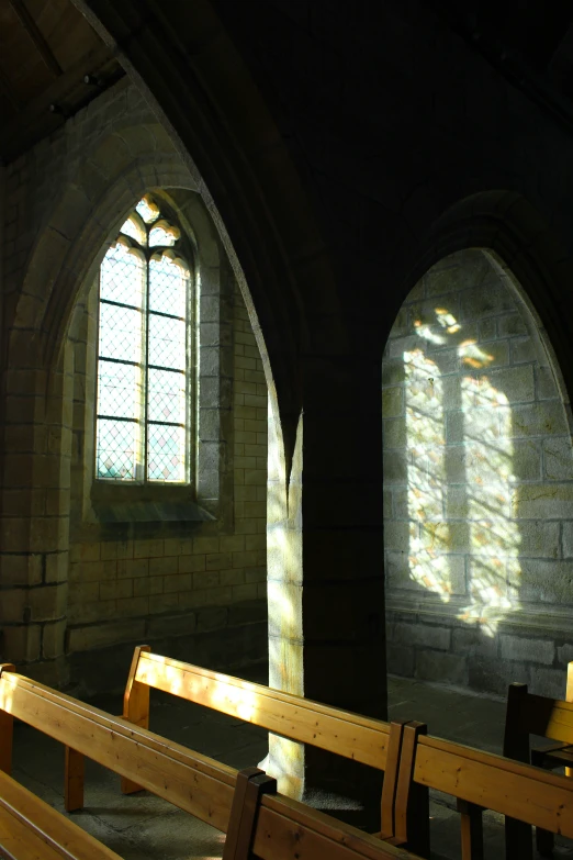 a church that has an arched glass window