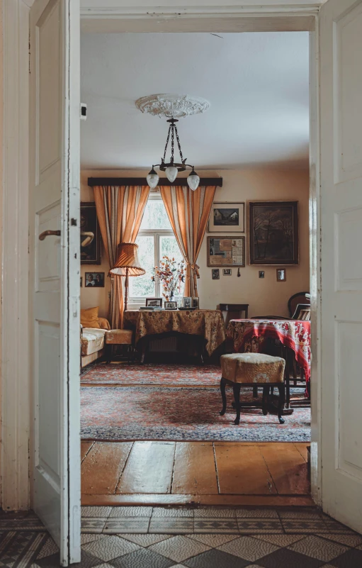 the doorway to the living room is open to see inside