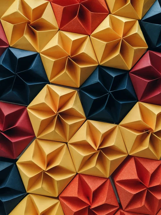 folded origami paper showing colorful shapes