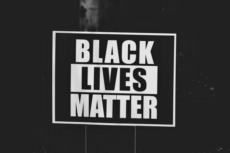 a sign stating that black lives matter is displayed