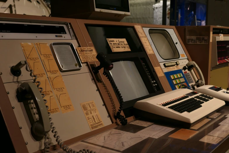 a old phone and control board sit on the table