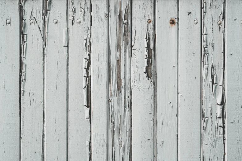 an old wooden paneled wall in black and white