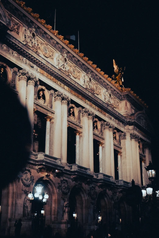 a building that is lit up with lights