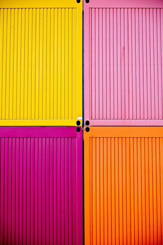 an image of colorful doors that are painted