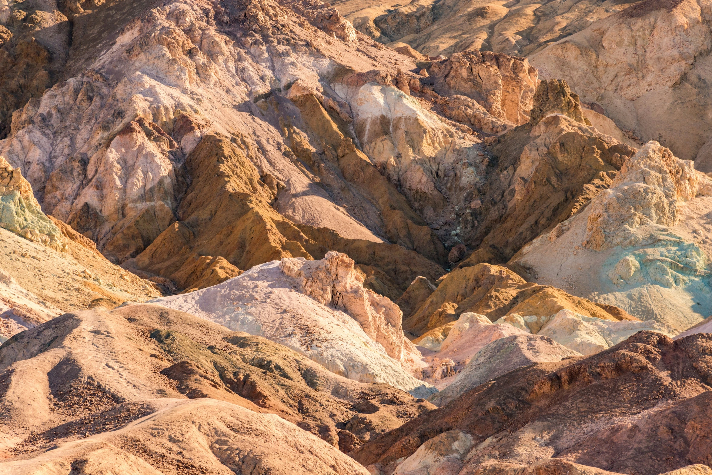 aerial view of the rocky mountain tops during sunset