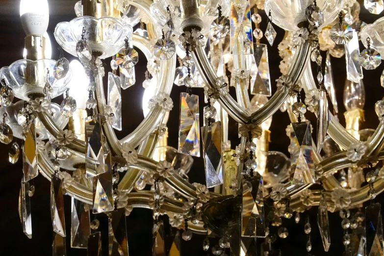 a light hanging from the ceiling made of crystal