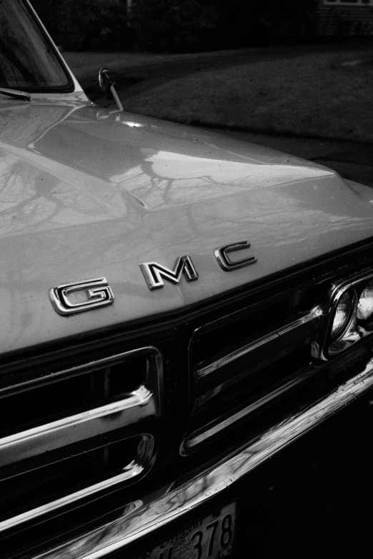 a close up of an old gmc truck