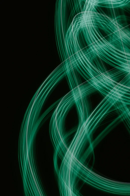 bright green lines are in motion against a black background