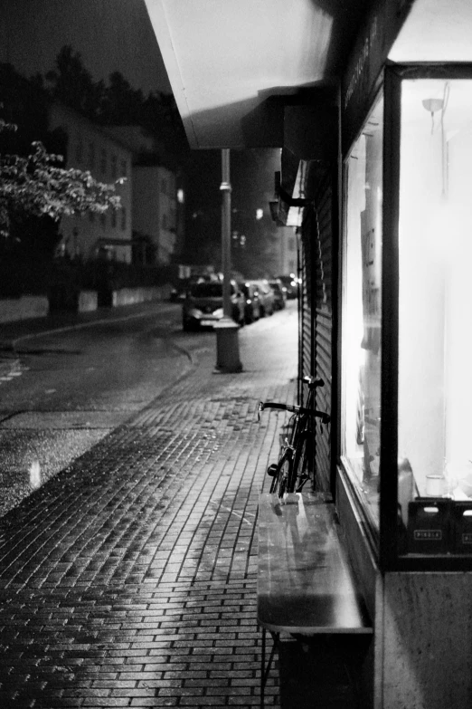 a small window with a street in the background