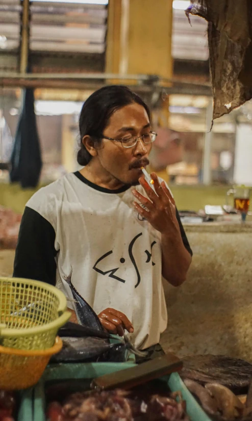 a woman who is talking to someone while he has food in his hand