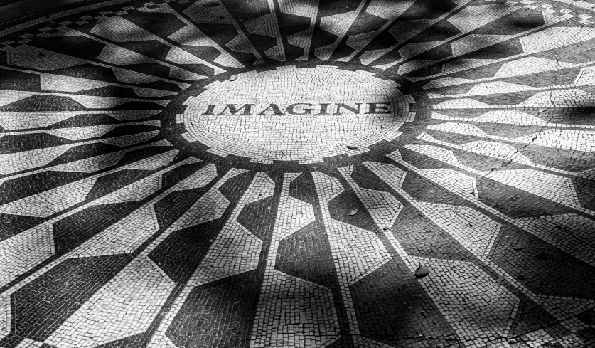 a close up view of the text imagine written in a mosaic pattern