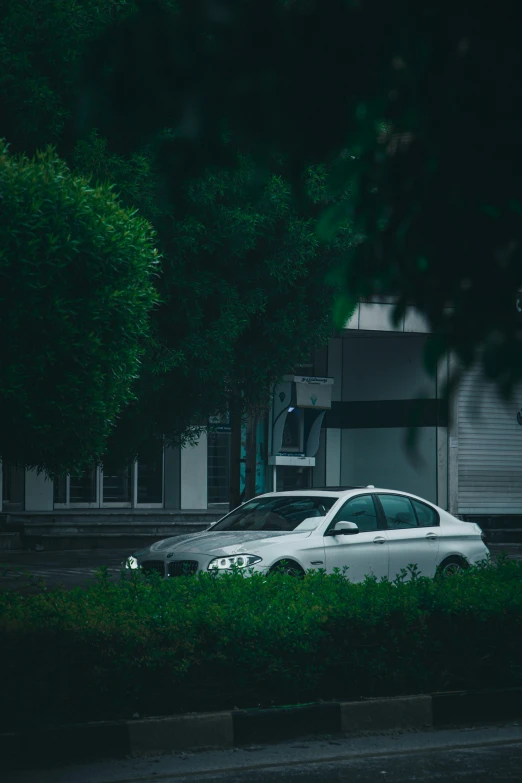 two cars parked in front of an office building