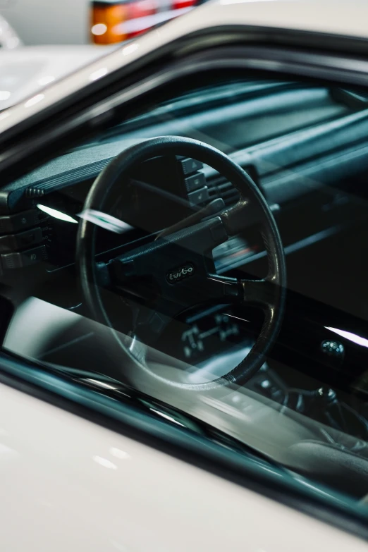 the inside view of a car mirror with it's reflection