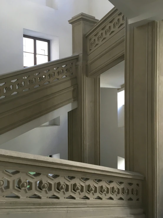 a stairway leading into an empty house from inside