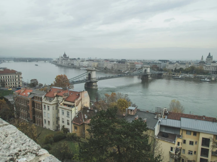 the view from above the city and river