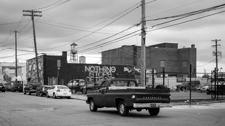 a black and white po of an old street with a sign that reads nothing but street