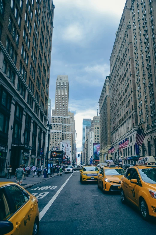 traffic jam in new york city surrounded by tall buildings