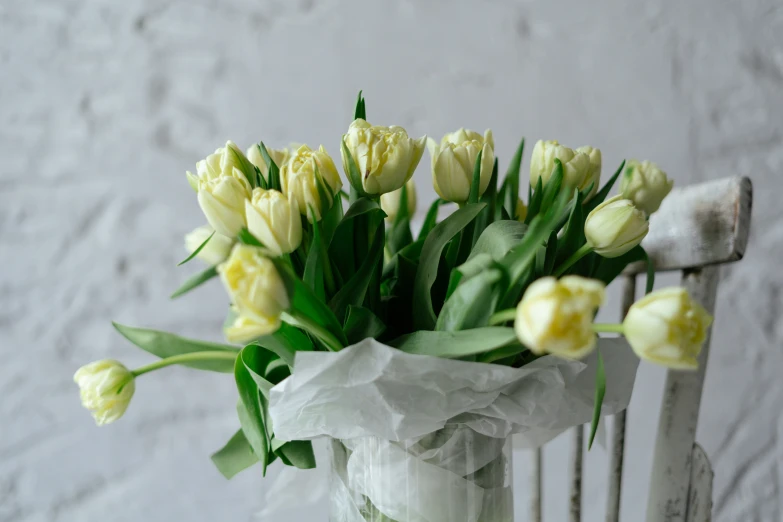 a vase with some flowers inside of it