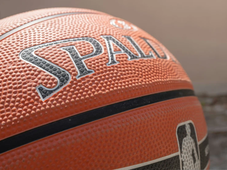 a basketball is shown with the spar logo on it