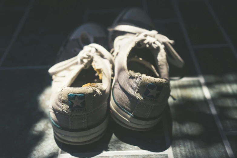 a pair of shoes sitting on a bench