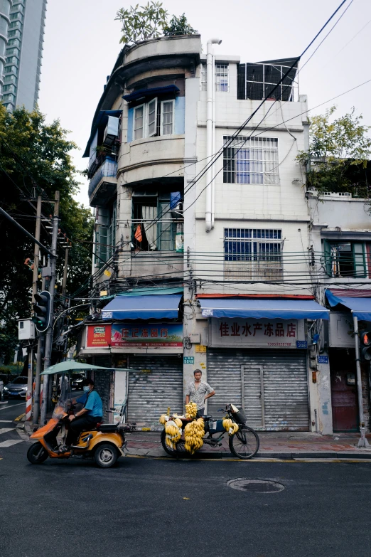 a yellow motorcycle on the side of the street