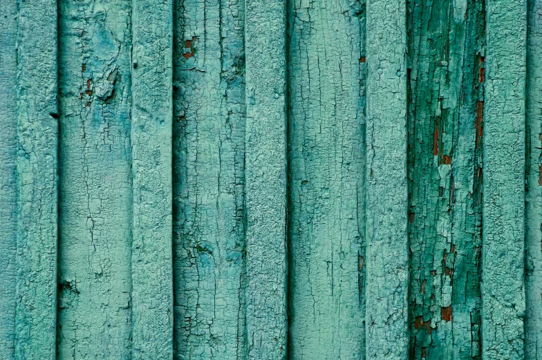 an abstract pograph of peeling green paint