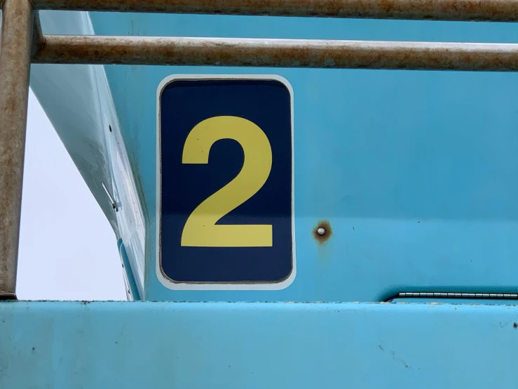 the number two signs are posted on the bus
