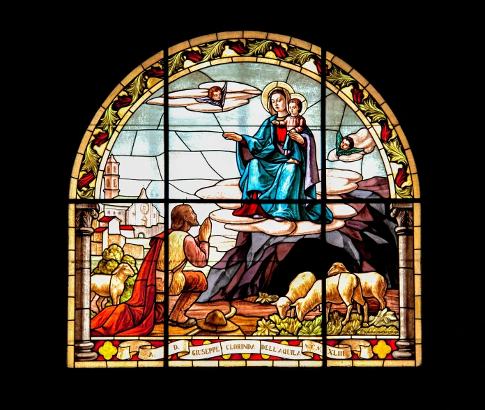 a stained glass window depicting jesus