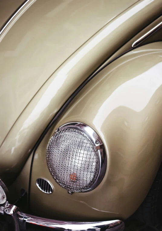 close up of the front of an old vintage beetle