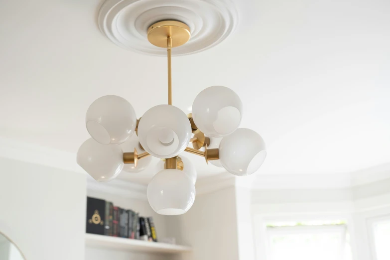 a room filled with furniture and a chandelier