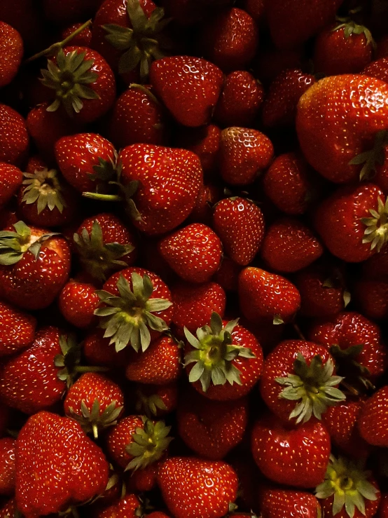 closeup of large group of ripe strawberries