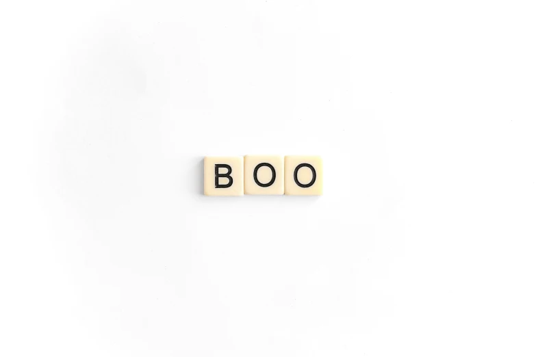 scrabble font on top of a white background