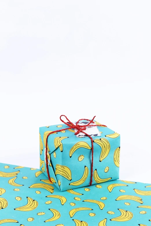 two presents are wrapped in bright, brightly colored wrapping paper