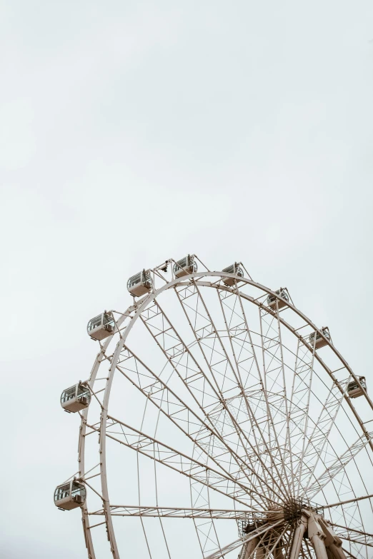 a ferris wheel with many people around it