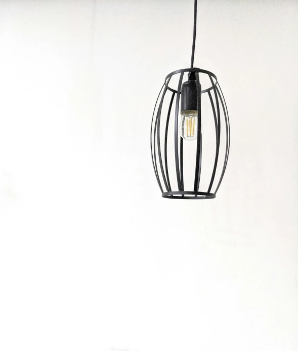 a pendant light in an open area of the room