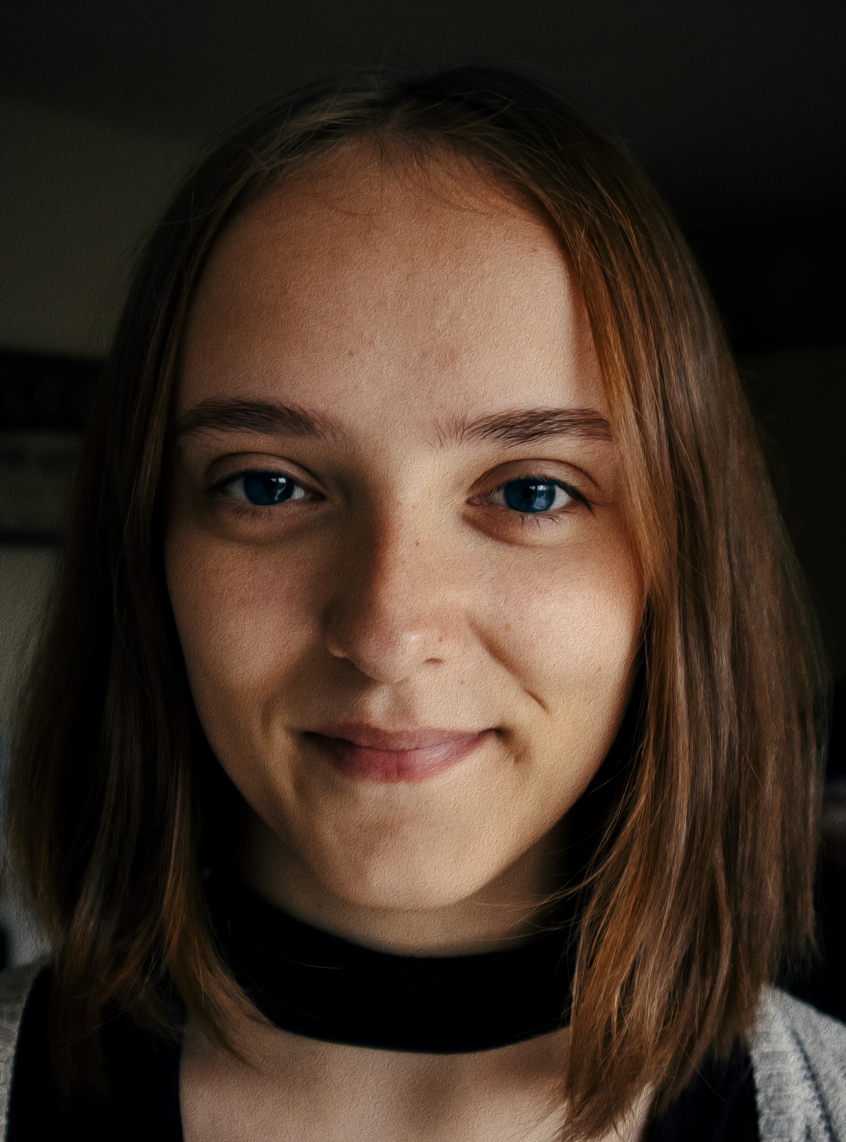 a woman with long brown hair is posing