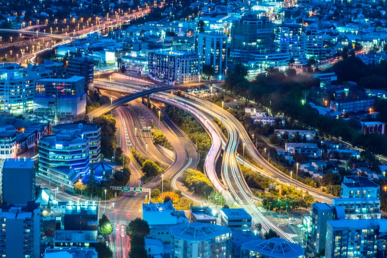 aerial s of city skyline at night with lights