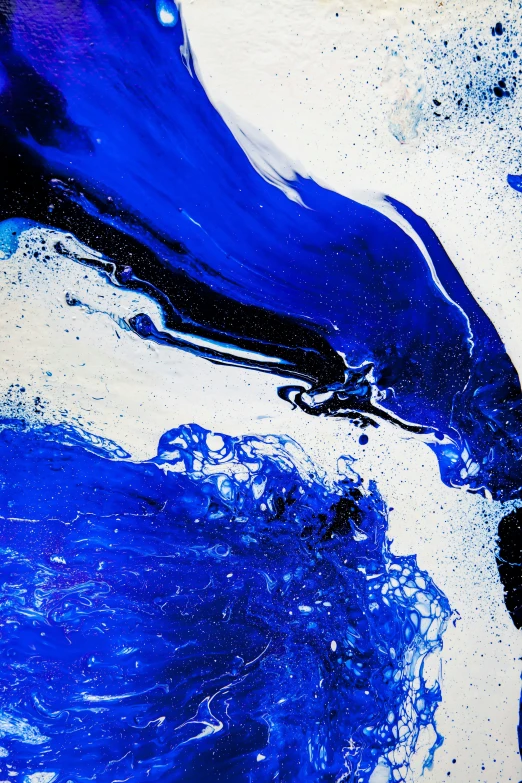 abstract painting in blues and white on canvas
