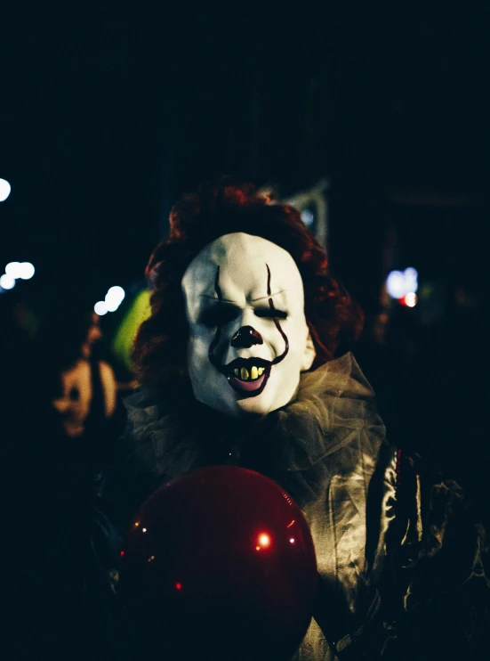 a man dressed up in a creepy costume