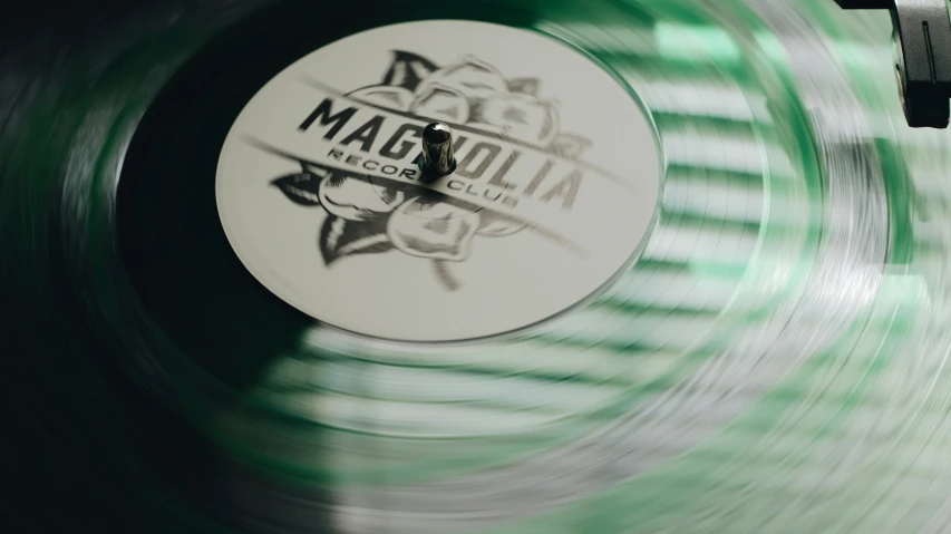 an old record has some green and black ink on it