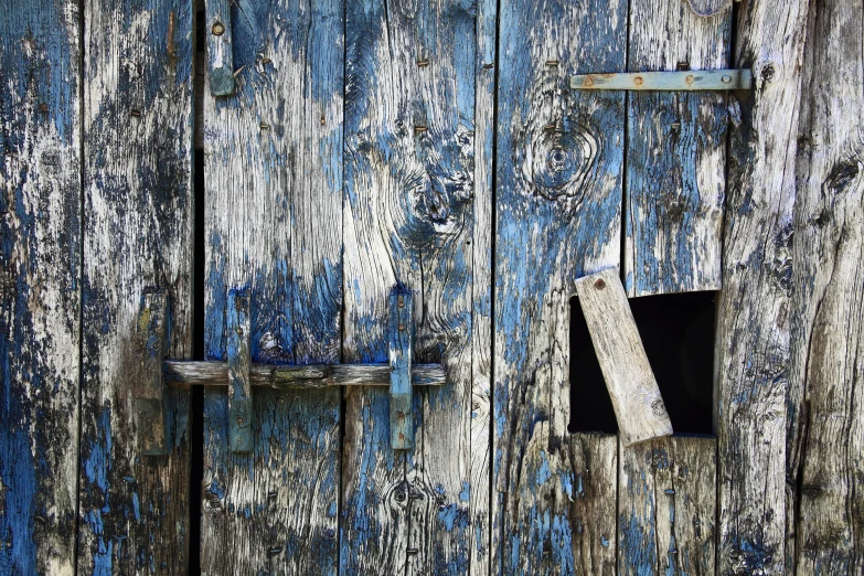 the old door with the black one is closed