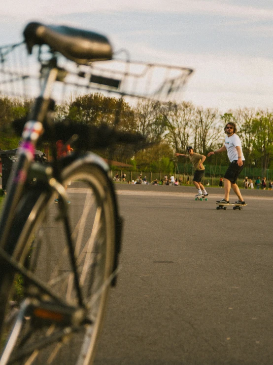 the young man is skateboarding in the road