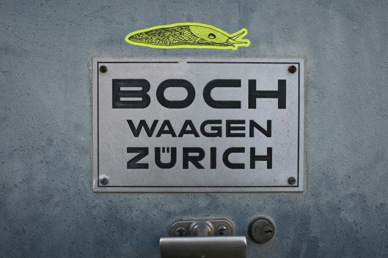 a sign is attached to a wall saying bosch wagen zurch