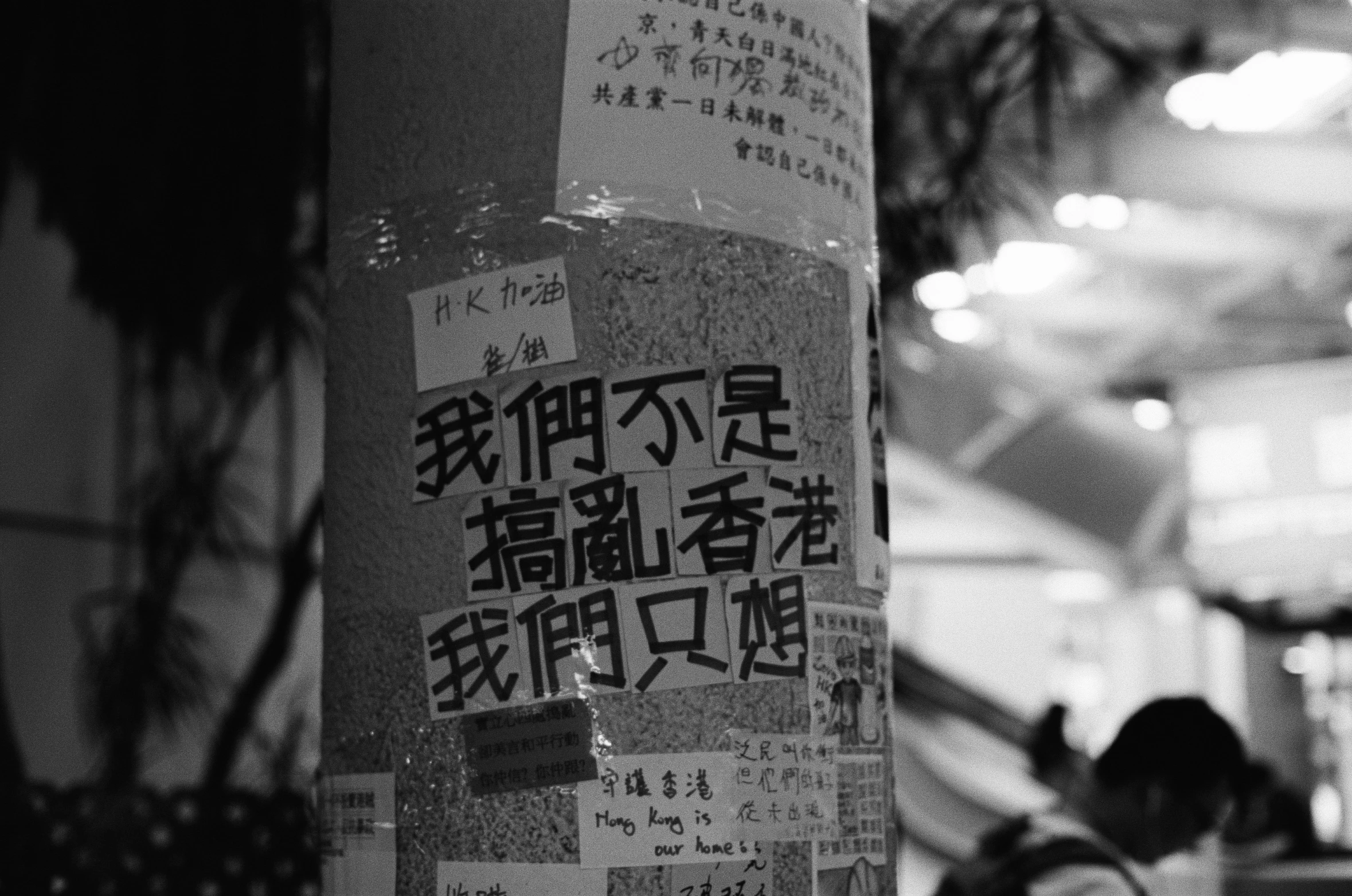 an image of a post with several signs on it