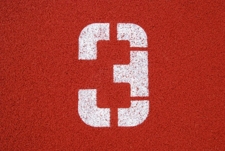 the white letter c is on the red surface
