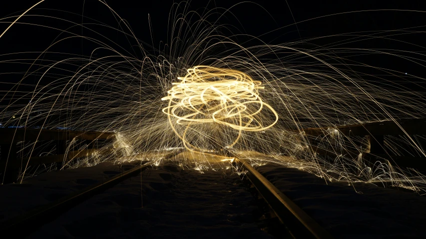 the lights are glowing all around the train tracks